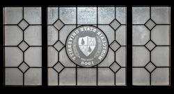 University seal in window